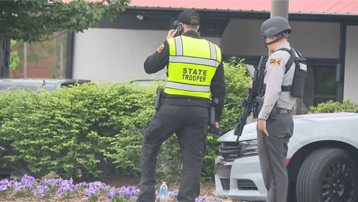 Investigators work to identify all parties amid conflicting reports on suspect status