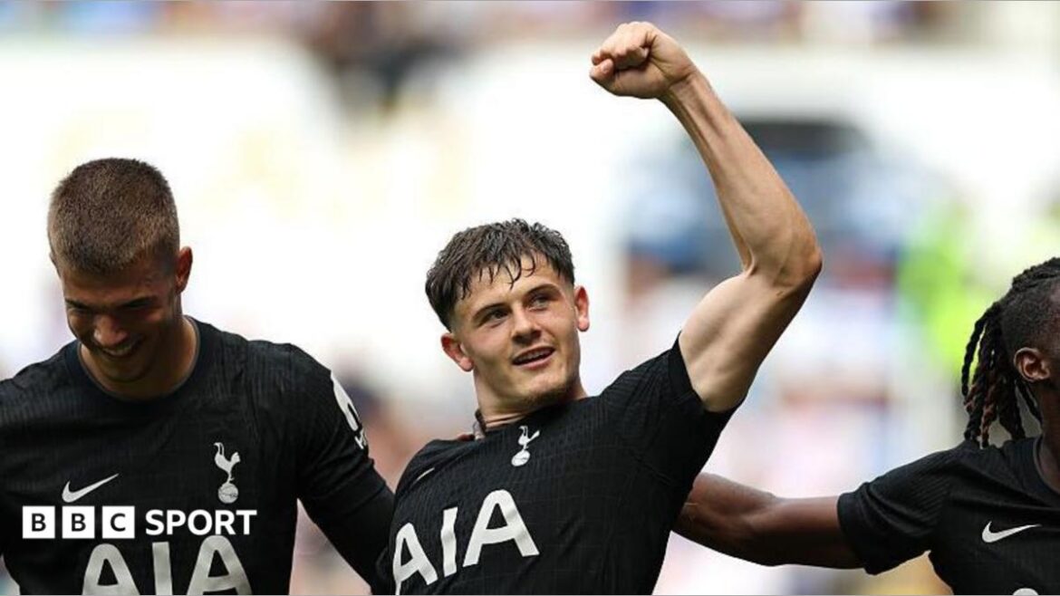 Will Lankshear punches the air after a goal for Tottenham