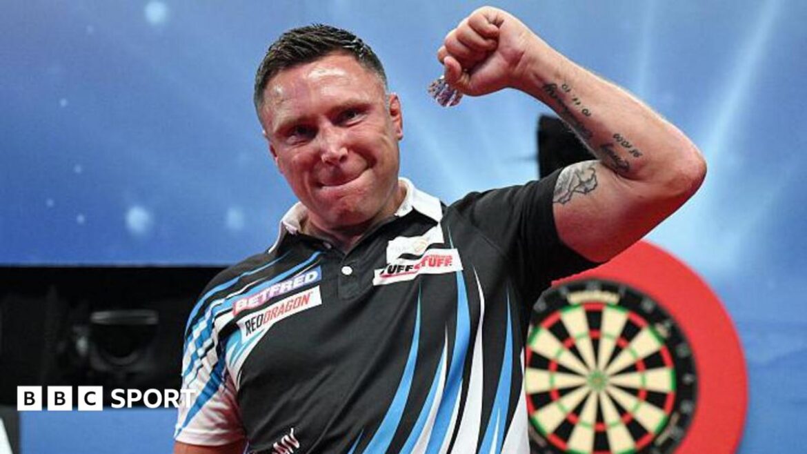 Gerwyn Price celebrates his win over Ross Smith by clenching his tattooed left bicep