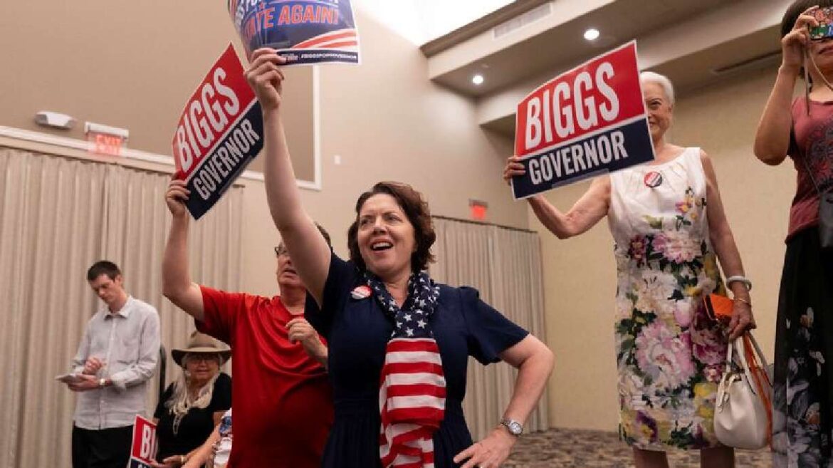 Supporters cheer during a "Get Out the Vote" rally in support of U.S. representative and Republican candidate for Arizona
