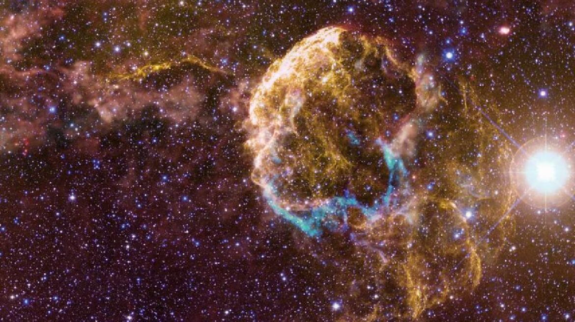 This multiwavelength scene shows the Jellyfish Nebula supernova remnant, the interstellar cloud it is interacting with, and