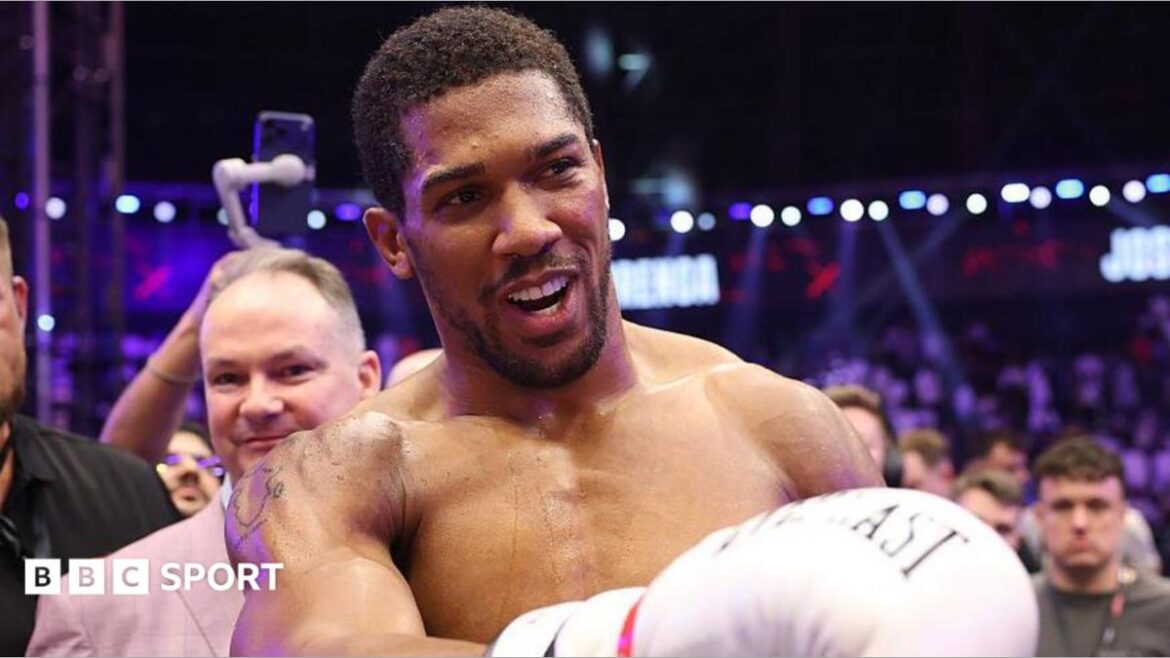 Anthony Joshua smiling after his win