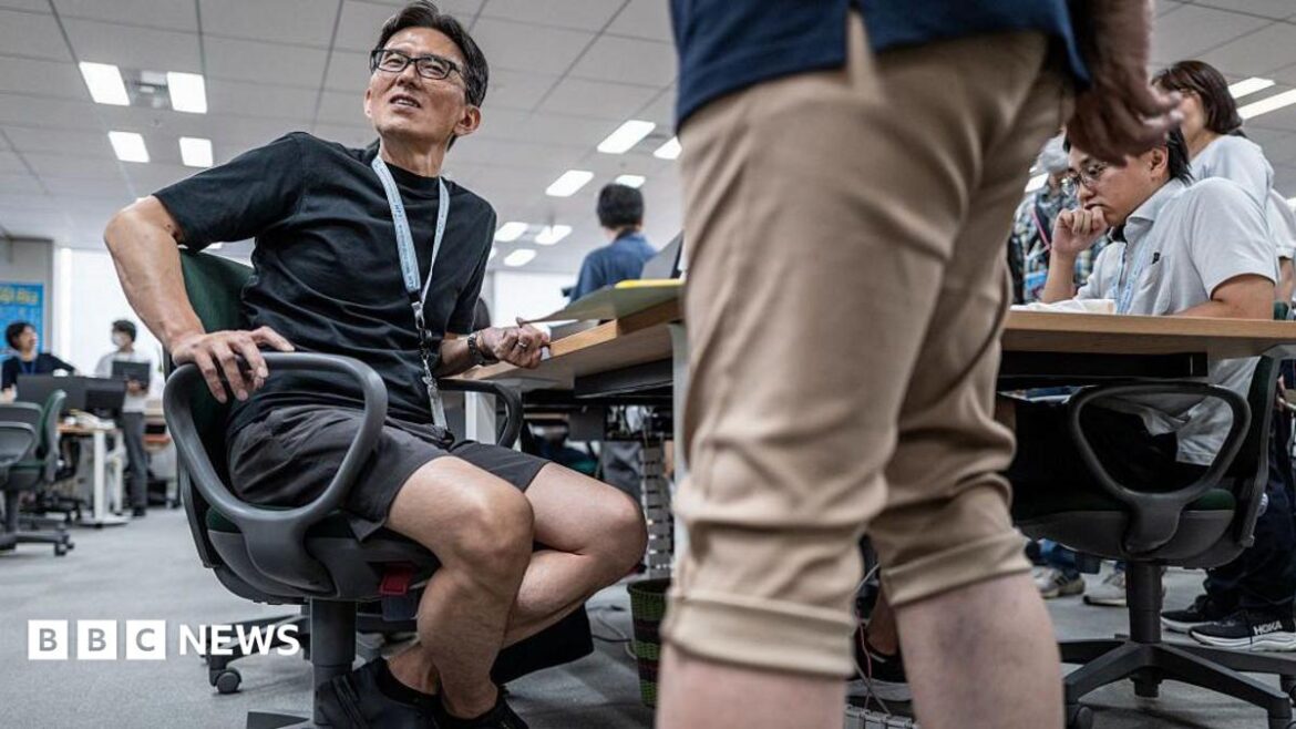 Japanese men in the office wearing shorts