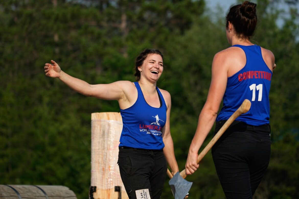 Karolina Urbanová, of the Czech Republic, and Stephanie Naud, of Canada, celebrate after Urbanovà broke the world record in