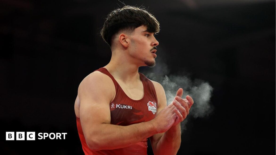Gabriel Langton of Team England looks on after competing in the floor exercise