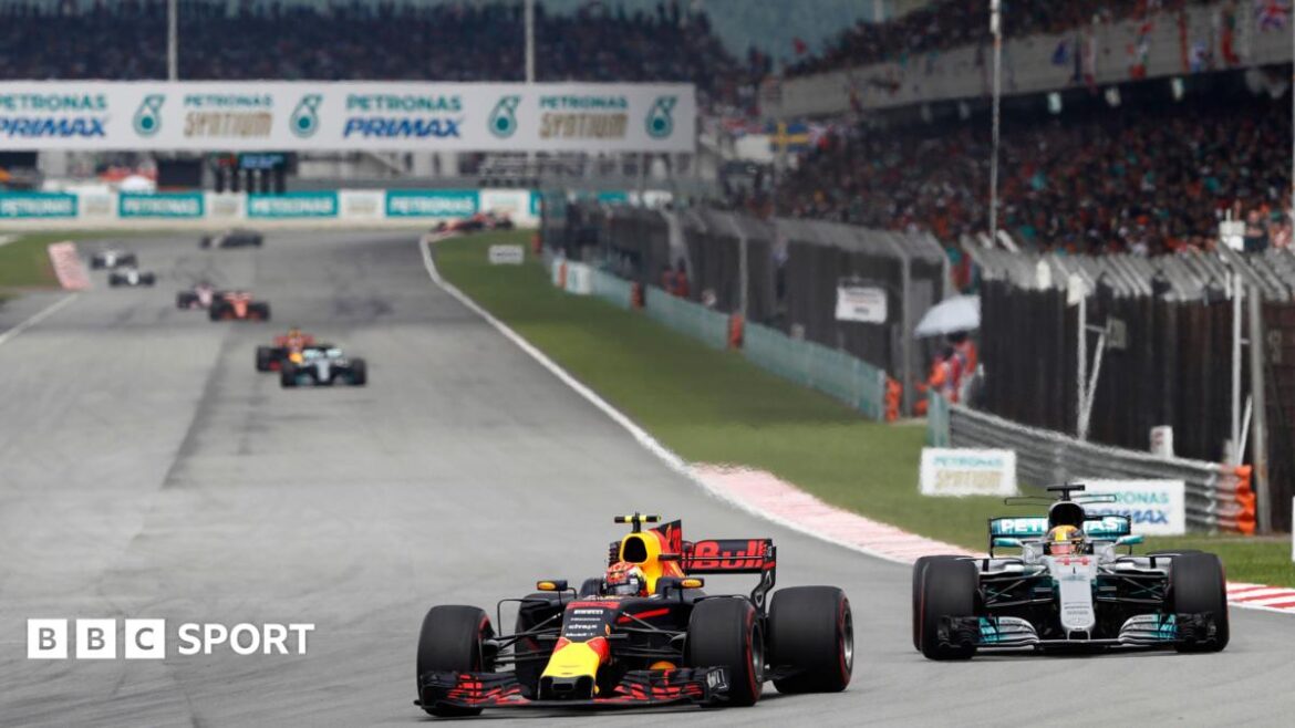 Red Bull's Max Verstappen leads Mercedes' Lewis Hamilton into the first corner of the 2017 Malaysian Grand Prix