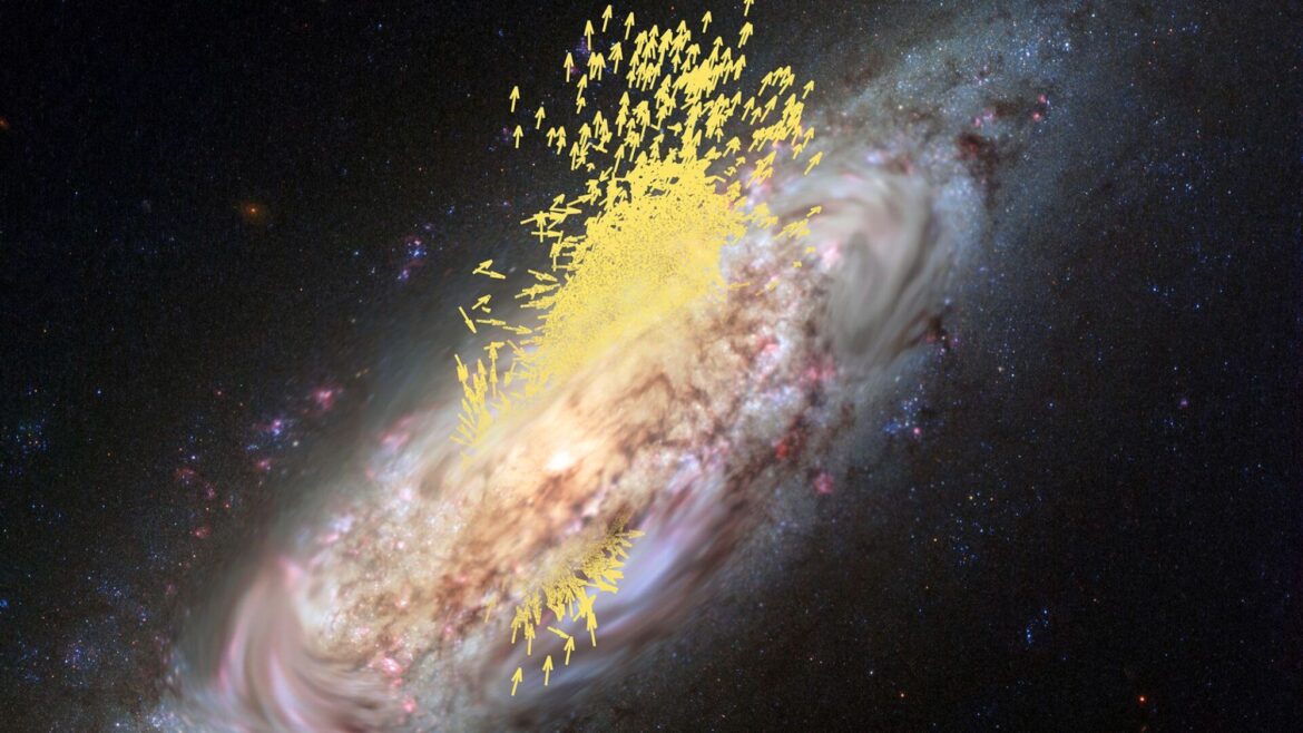 An image of the Milky Way with a bunch of yellow arrows going toward and through it