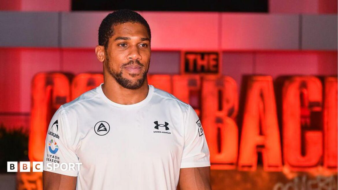 Anthony Joshua looking on