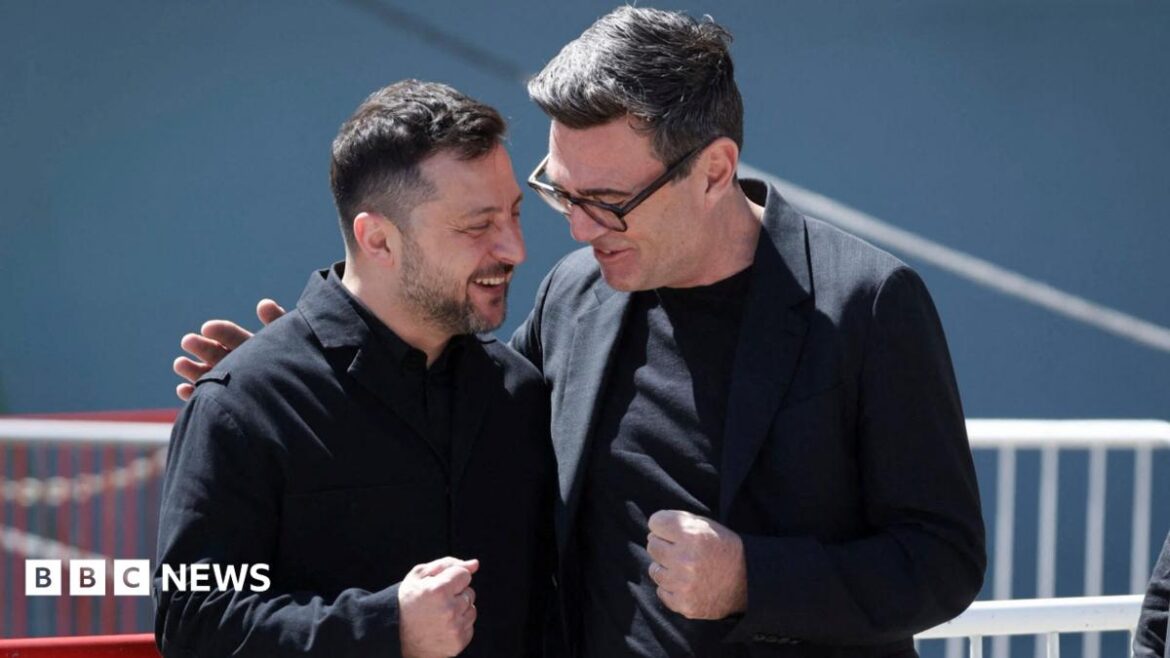 British Prime Minister Andy Burnham interacts with the President of Ukraine, Volodymyr Zelenskiy, during their visit to