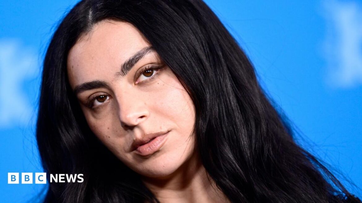 Charli XCX - close up of her face and long, dark hair
