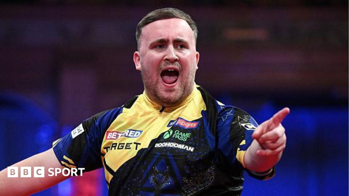 Luke Littler celebrates claiming a leg against Gerwyn Price in the World Matchplay final at Winter Gardens in Blackpool
