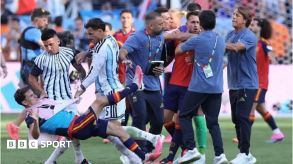Thiago Almada and Leandro Paredes throw Gavi to the ground as Roberto Ayala appears to hold Eric Garcia around the throat