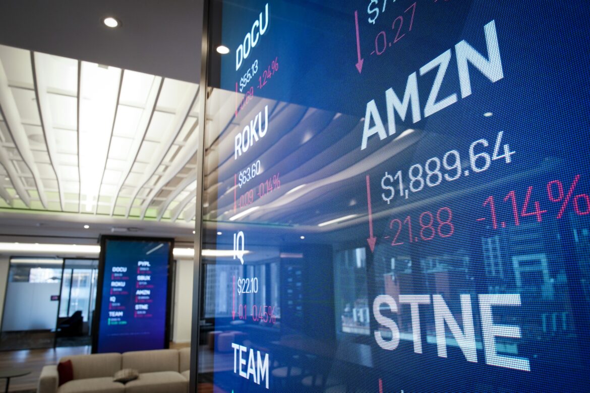 Stock information Amazon displayed monitor inside Nasdaq's