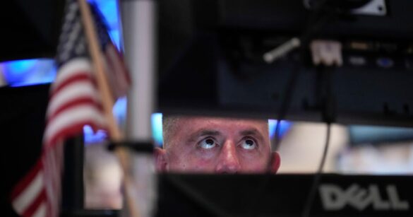 A trader works on the floor of the New York Stock Exchange, Thursday, July 30, 2026, in New York. (AP Photo/Yuki Iwamura)