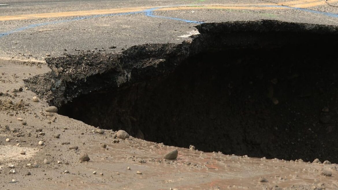 Calgary Bowness Road Water Main Break and Sinkhole Shut Down Businesses