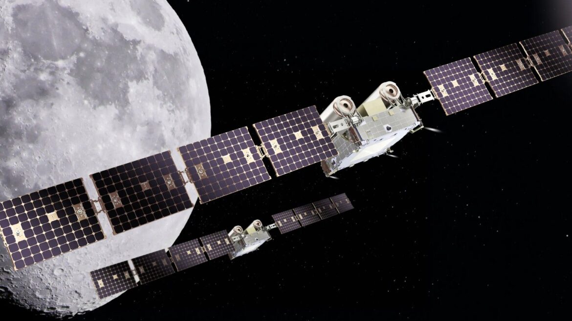 two small rectangular spacecraft with long wing-like solar panels fly above the moon