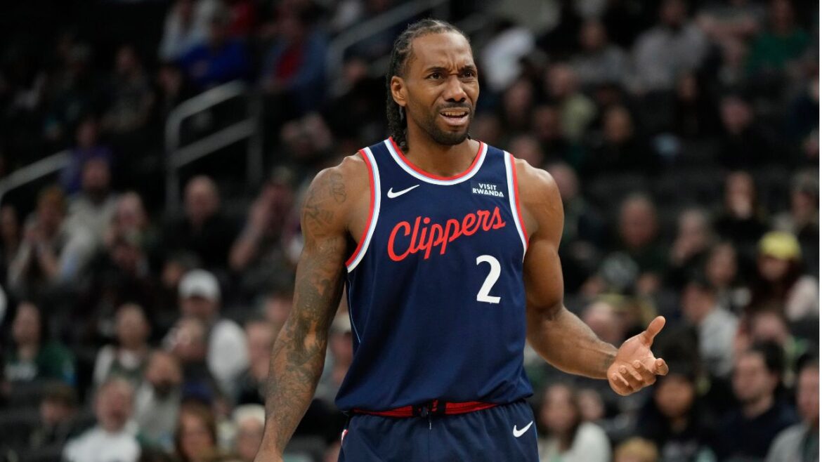 LA Clippers' Kawhi Leonard reacts to a call during the second half of an NBA basketball game against the Milwaukee Bucks