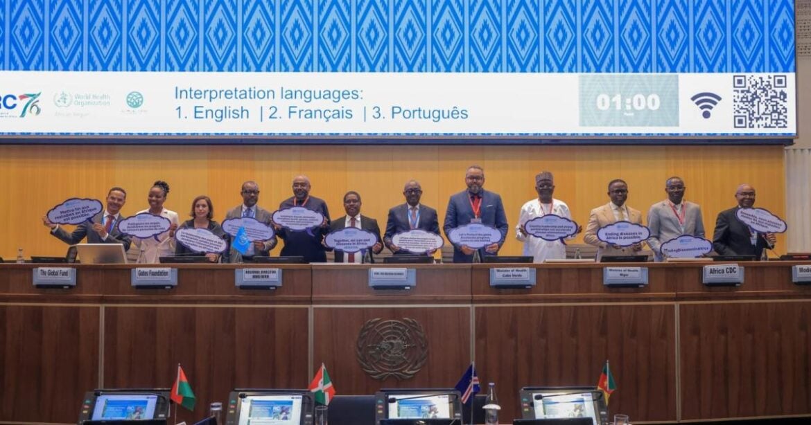 Health ministers and partners hold signs reading “Ending diseases in Africa is possible” at the Seventy-sixth session of the