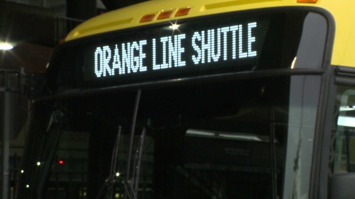 orange line shuttle mbta bus sign