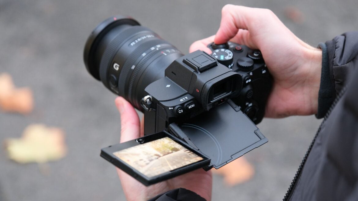 Sony A7 V camera held in a person