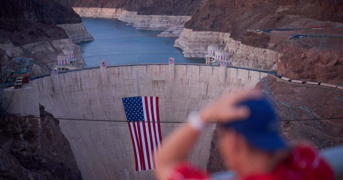A bathtub ring of light minerals shows the high water line of Lake Mead near the Hoover Dam at the Lake Mead National