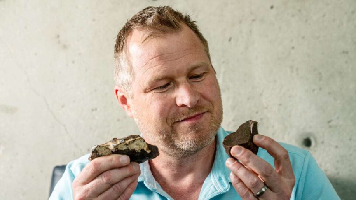 James Karner, a research professor in the Department of Geology and Geophysics at the University of Utah, examines fragments