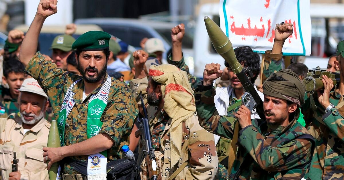 Fighters loyal to the Houthi authorities shout slogans during a rally to recruit more fighters, in Sanaa, Yemen, on Sept