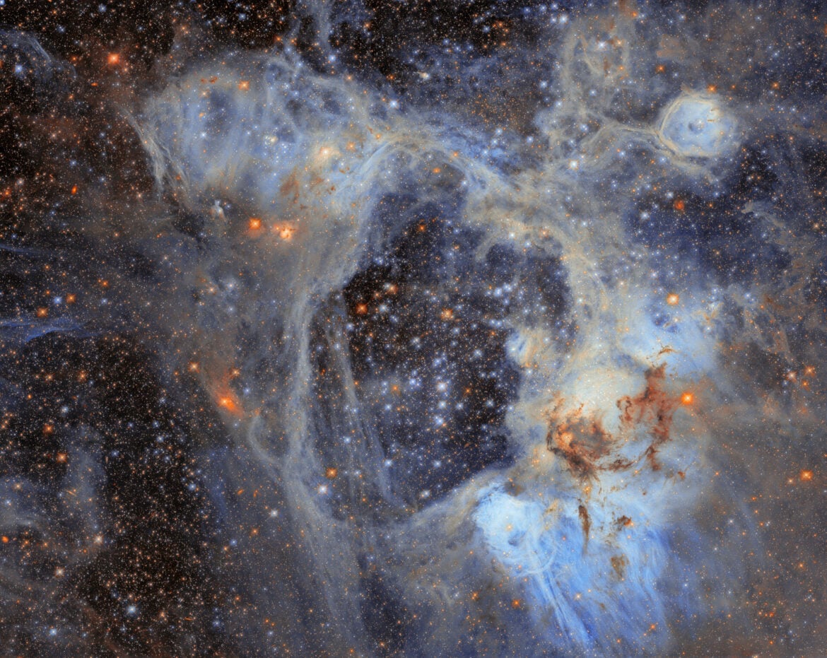 Hubble Telescope Reveals Massive Cosmic Superbubble in Large Magellanic Cloud