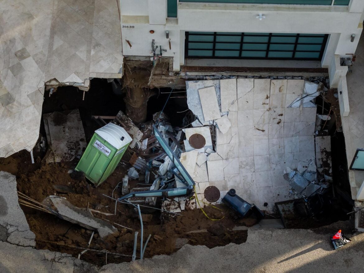 An aerial view of a sinkhole in Nicolas Cage's driveway