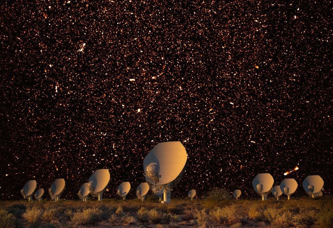 The MeerKAT array at night in South Africa, with bright radio sources represented in the night sky. Credit: SARAO