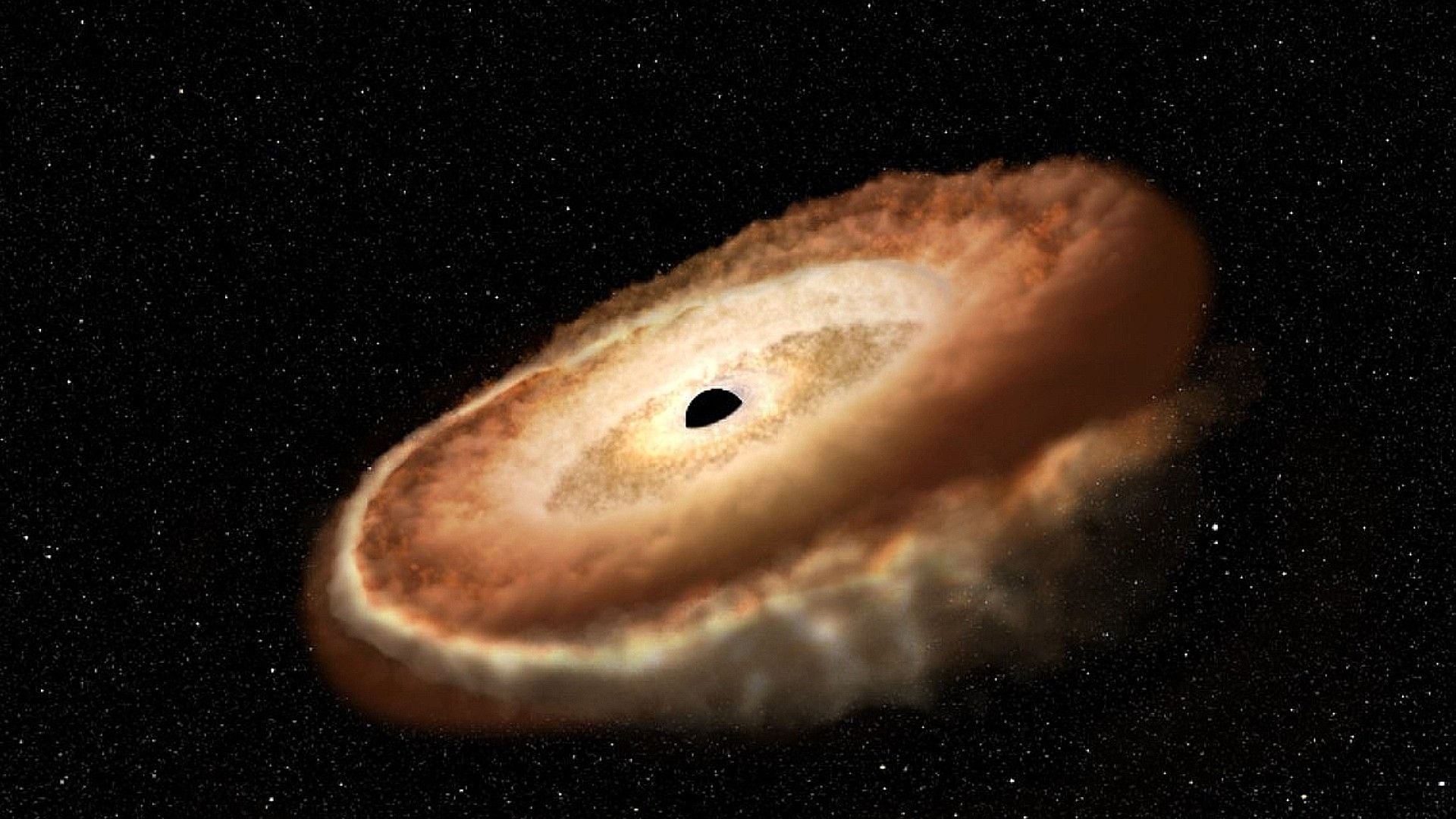 A star is shredded into a donut shape by a supermassive black hole