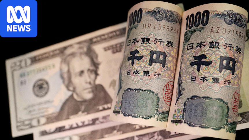 A close up of the Japanese yen with writing in Japanese and a photo of a man