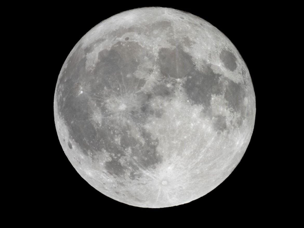 Detailed telescopic view of the full Moon against a black sky
