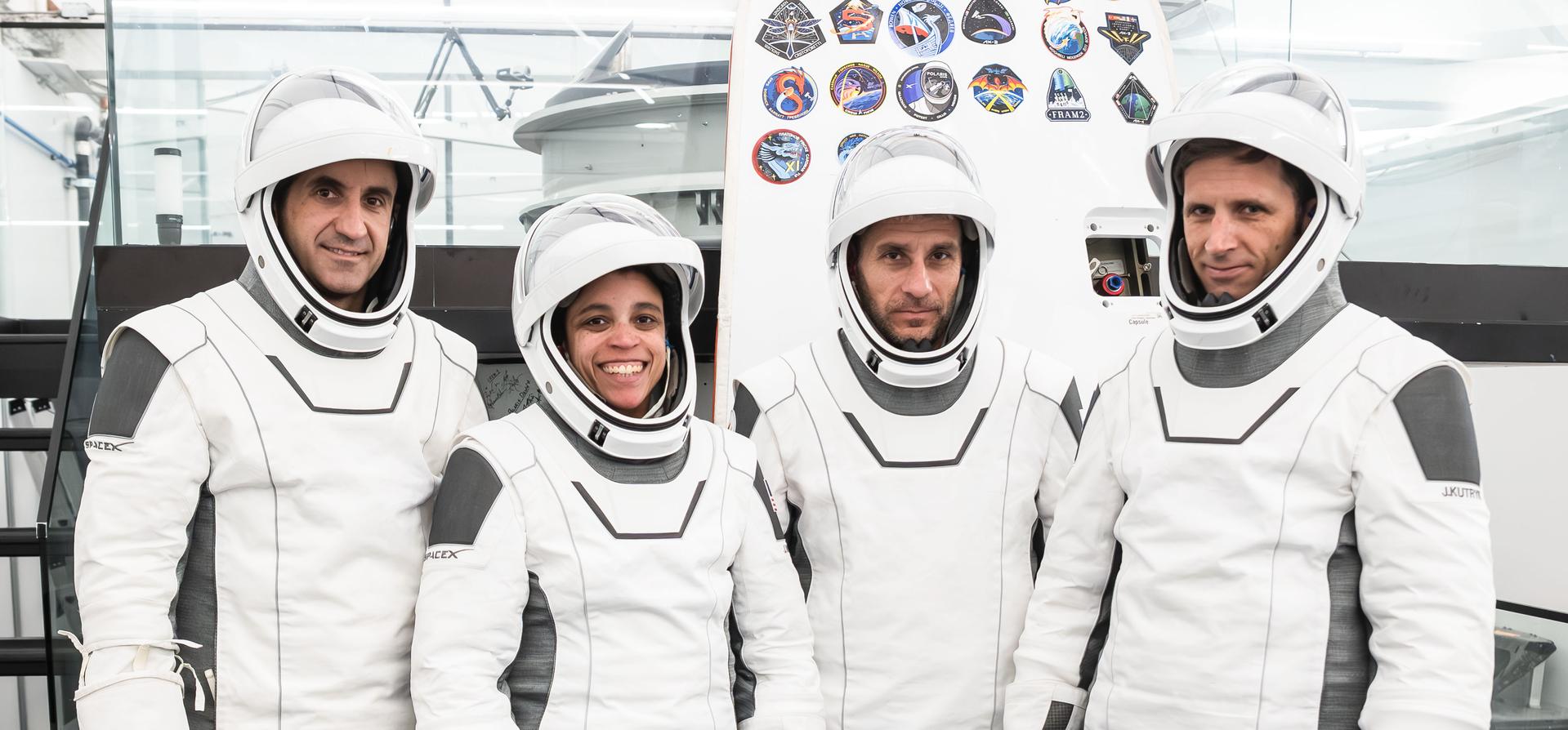 The SpaceX Crew-13 members pose for a portrait in their pressure suits during a preflight training session at the company's