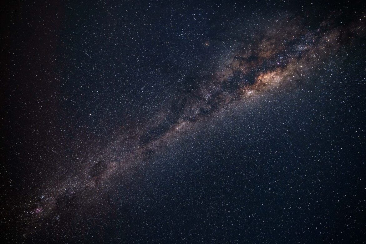 The Milky Way crossing a dark, star-filled night sky