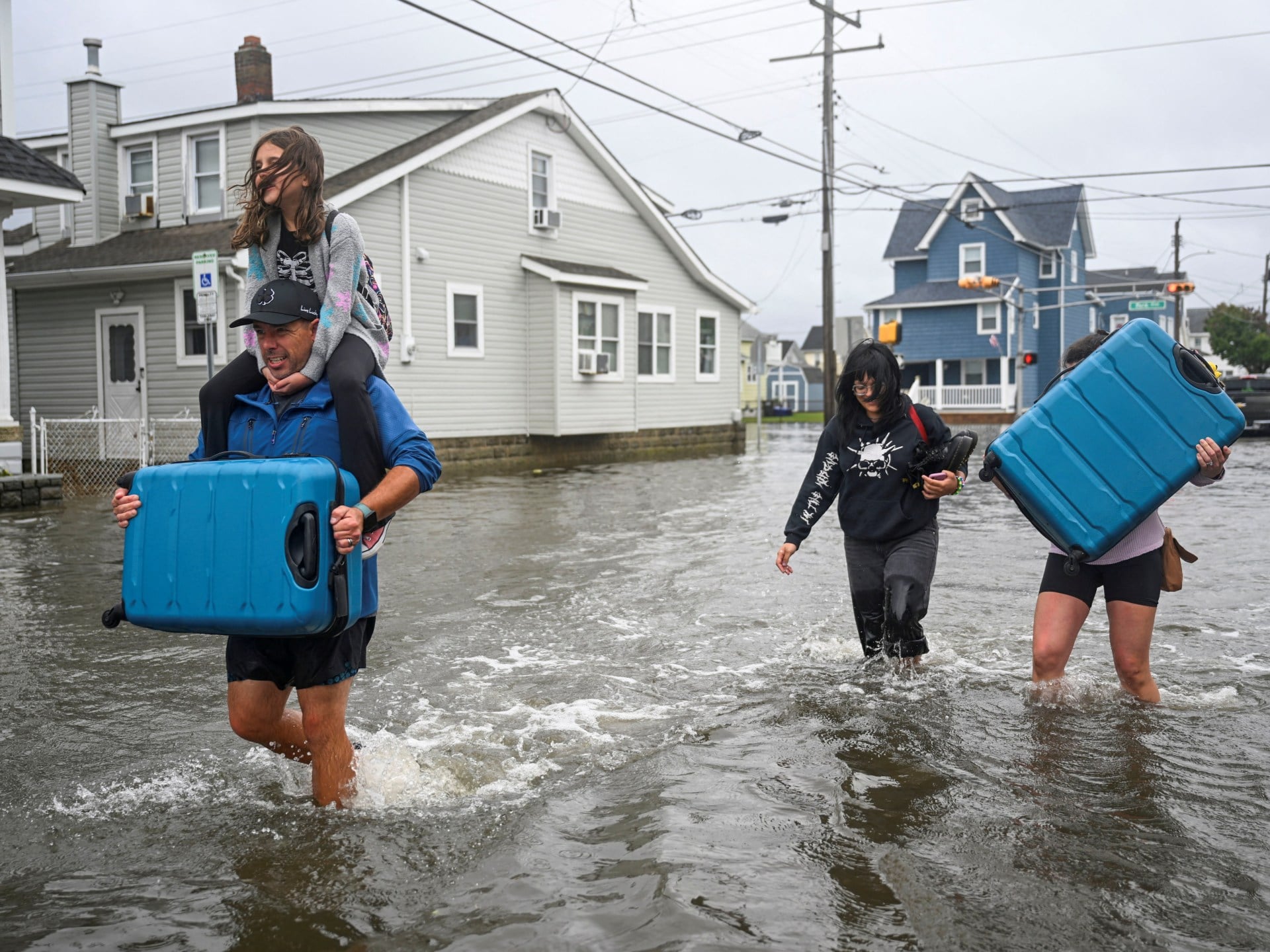 One dead as powerful storm brings flooding, power cuts to northeastern US
