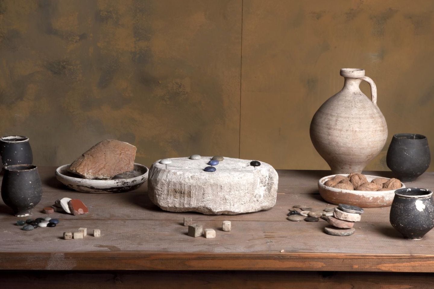 The Roman stone pictured with pieces that were not found with the artifact