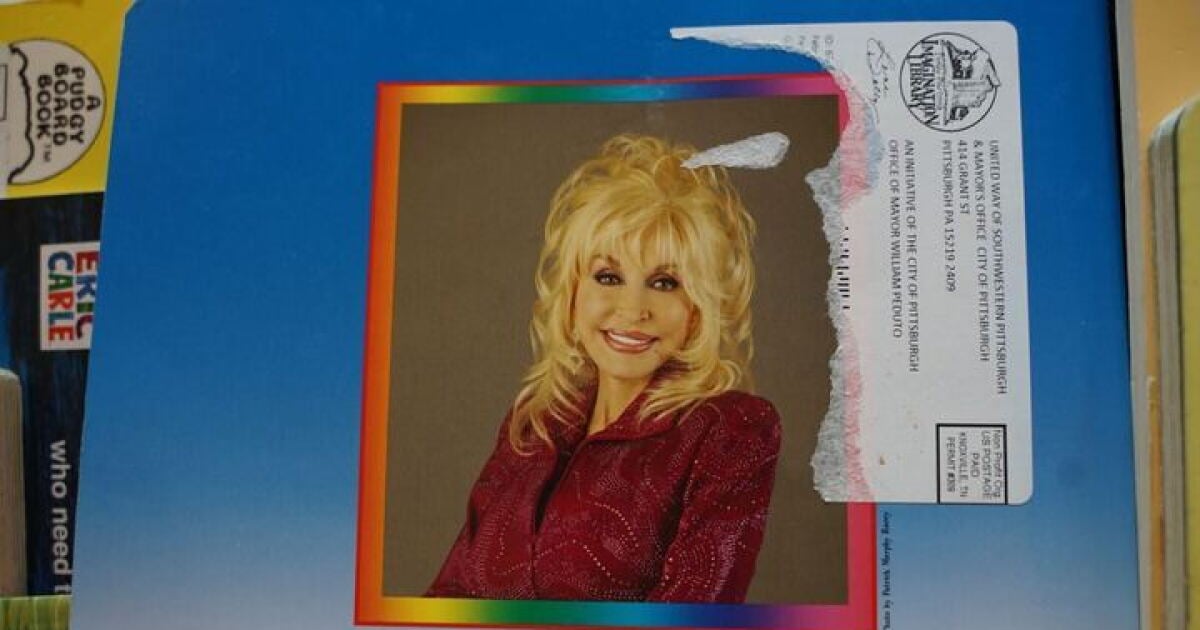 A picture of Dolly Parton on the back of a children's book she authored