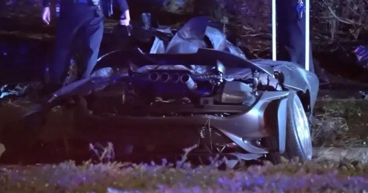 Aftermath of a deadly crash, when a McLaren lost control and ran into a tree in Irvine on Sunday