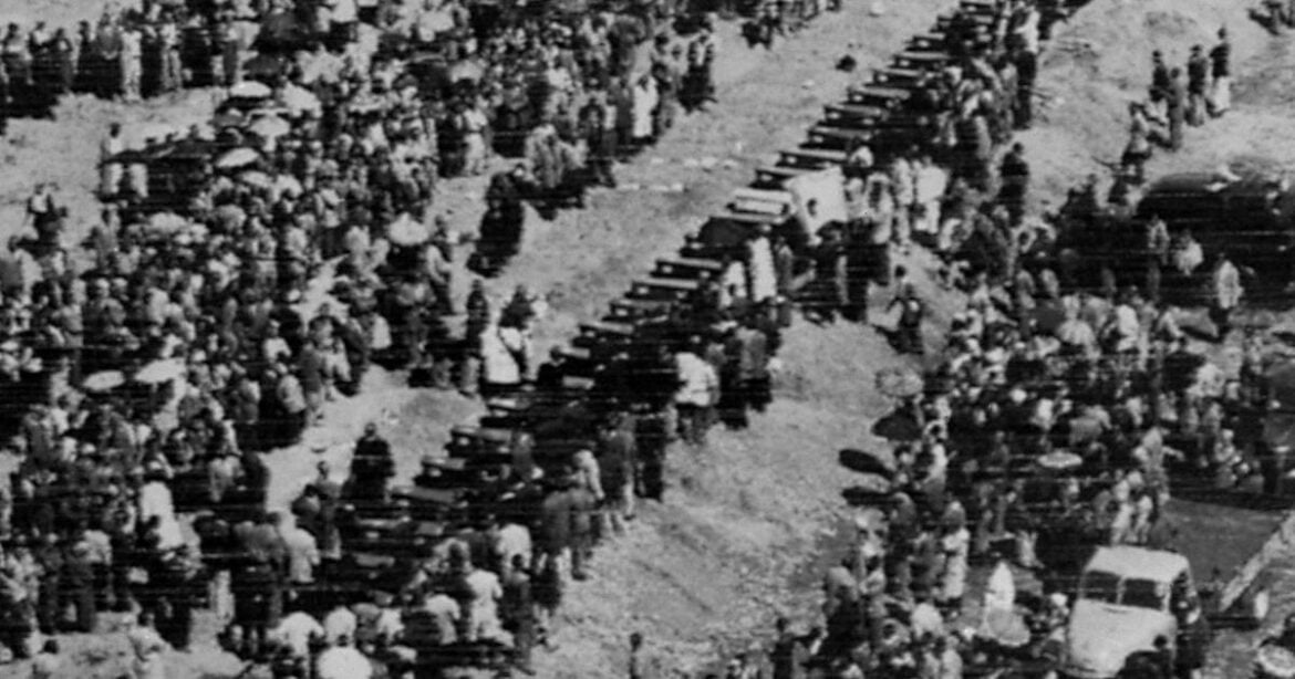 FILE - A mass funeral takes place in Sharpeville, South Africa, March 30, 1960, for victims of the Sharpeville Massacre, in