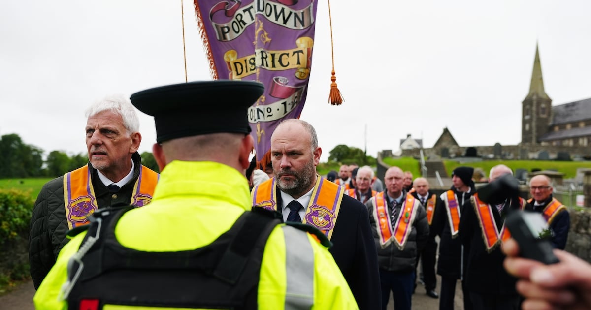 Police form a barricade as Orangemen seek to parade from Drumcree Church towards the Garvaghy Road in Portadown in recent