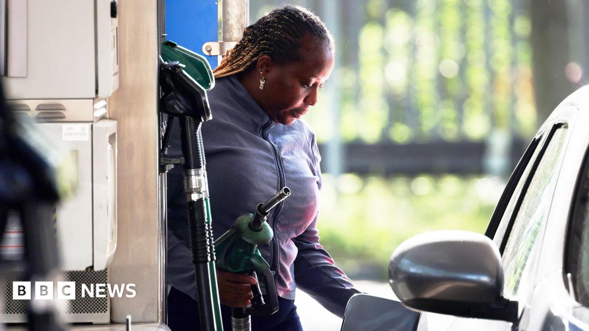 A woman filling up her car with petrol in London April 2026