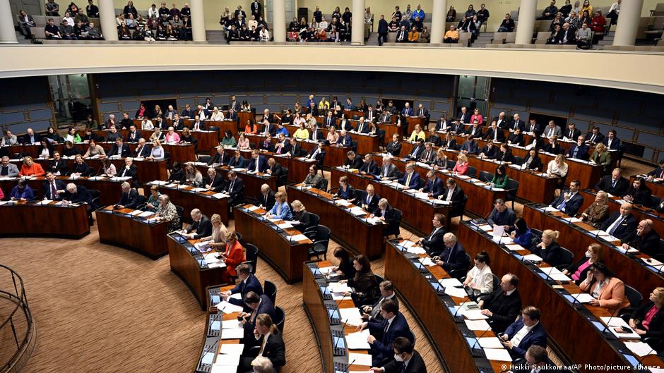 Parliament members attend the plenary session where Finnish Parliament voted on Finland's accession to NATO in Helsinki