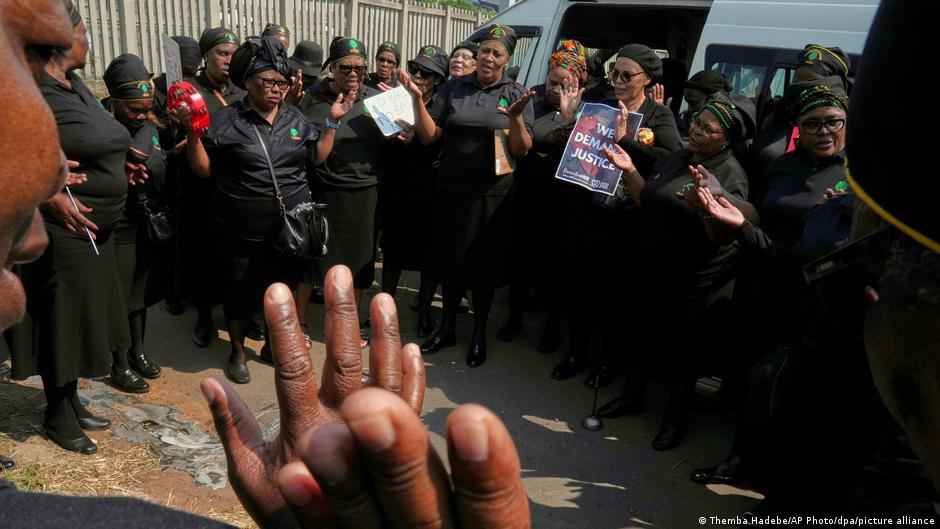 In Kempton Park, a church women's group, all dressed in black, honors murder victims