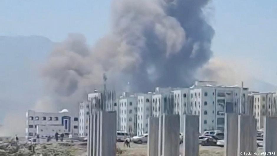 Smoke rises near buildings in Taiz Governorate, Yemen