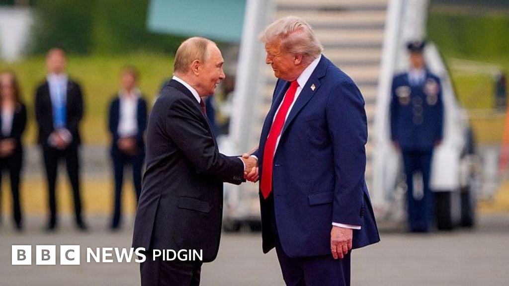 Putin and Trump dey shake hands, wit Air Force One for di background