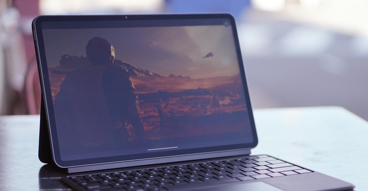 A photo of a tablet on a table, in a keyboard case