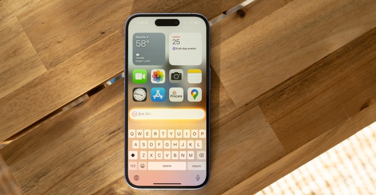 Image of iPhone 16 running iOS 18.1 with Apple Intelligence on a bench