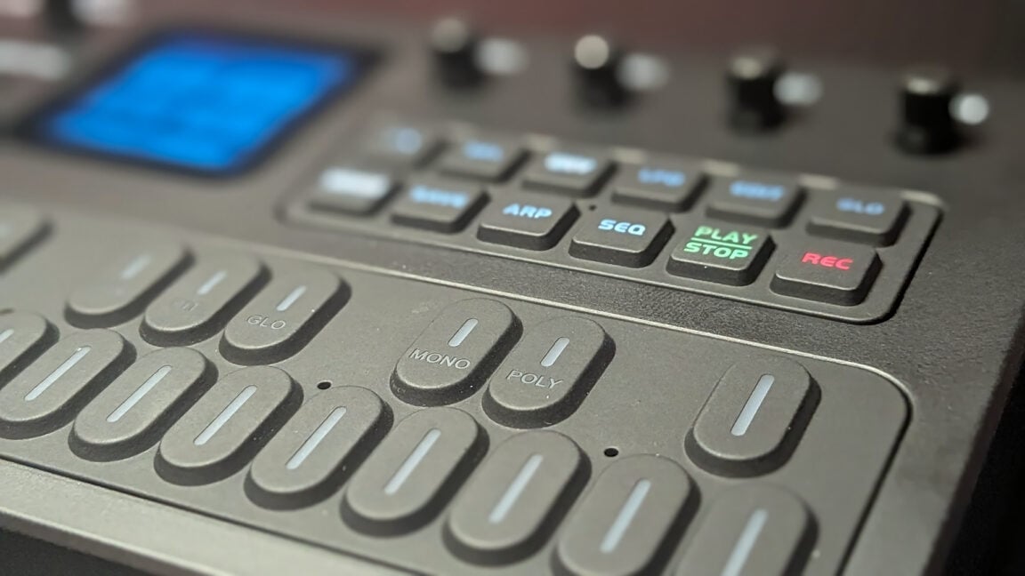 A close-up shot of the buttons and keys on the FM-1