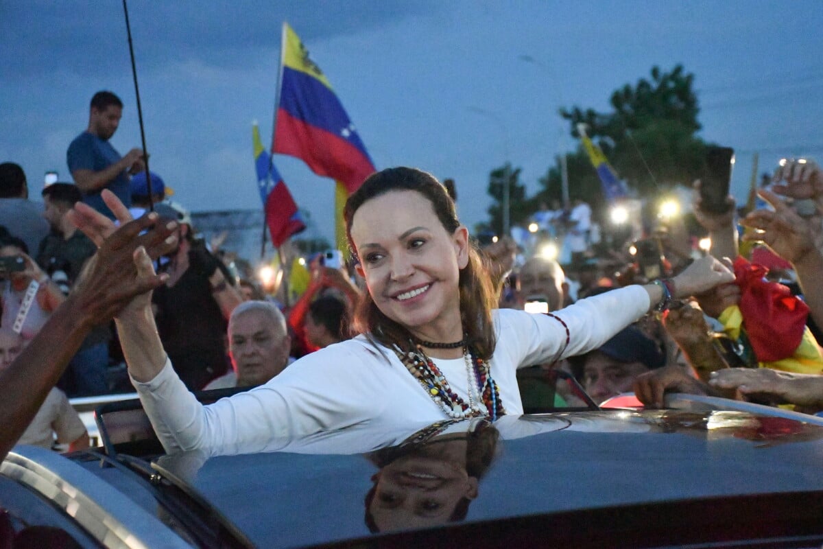 Venezuelan opposition leader and Nobel Peace Prize laureate Maria Corina Machado greets supporters in Valencia, Venezuela